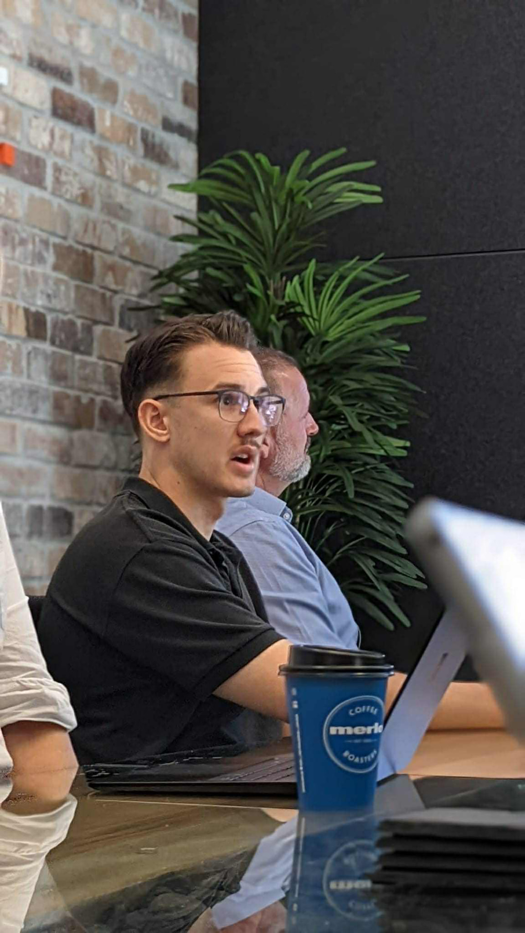 Caleb Johnstone discussing local SEO strategy in a client meeting